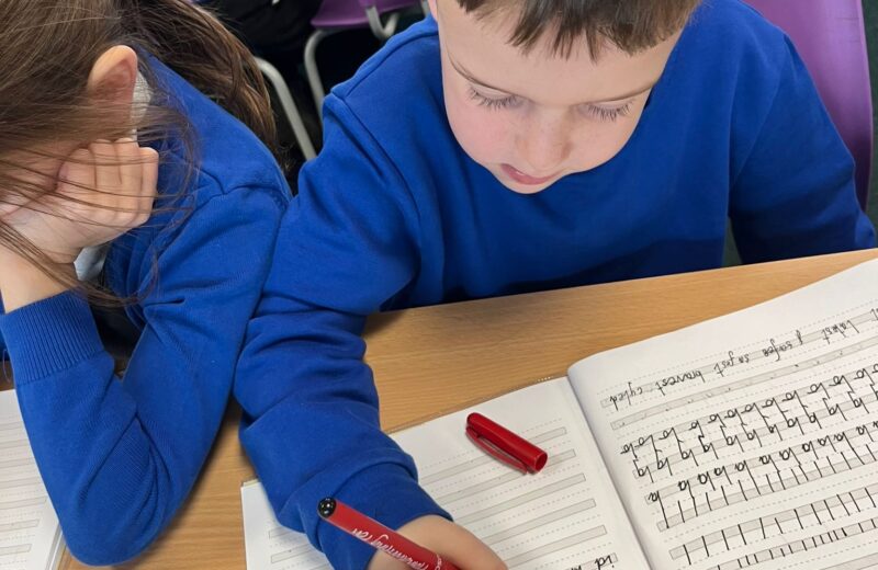 2S showcase their handwriting.